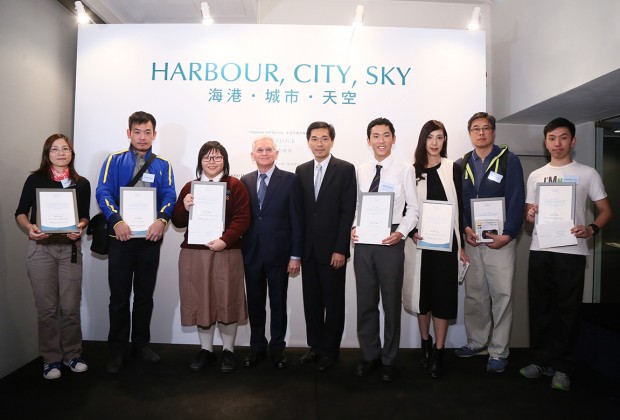 Edward Stokes, Judge of the Competition and Curator of the Exhibition (fourth left) and Ricky Wong, Managing Director of Wheelock Properties (fifth left) presented certificates and prizes to Harbour Sights Wheelock Photography Competition winners.